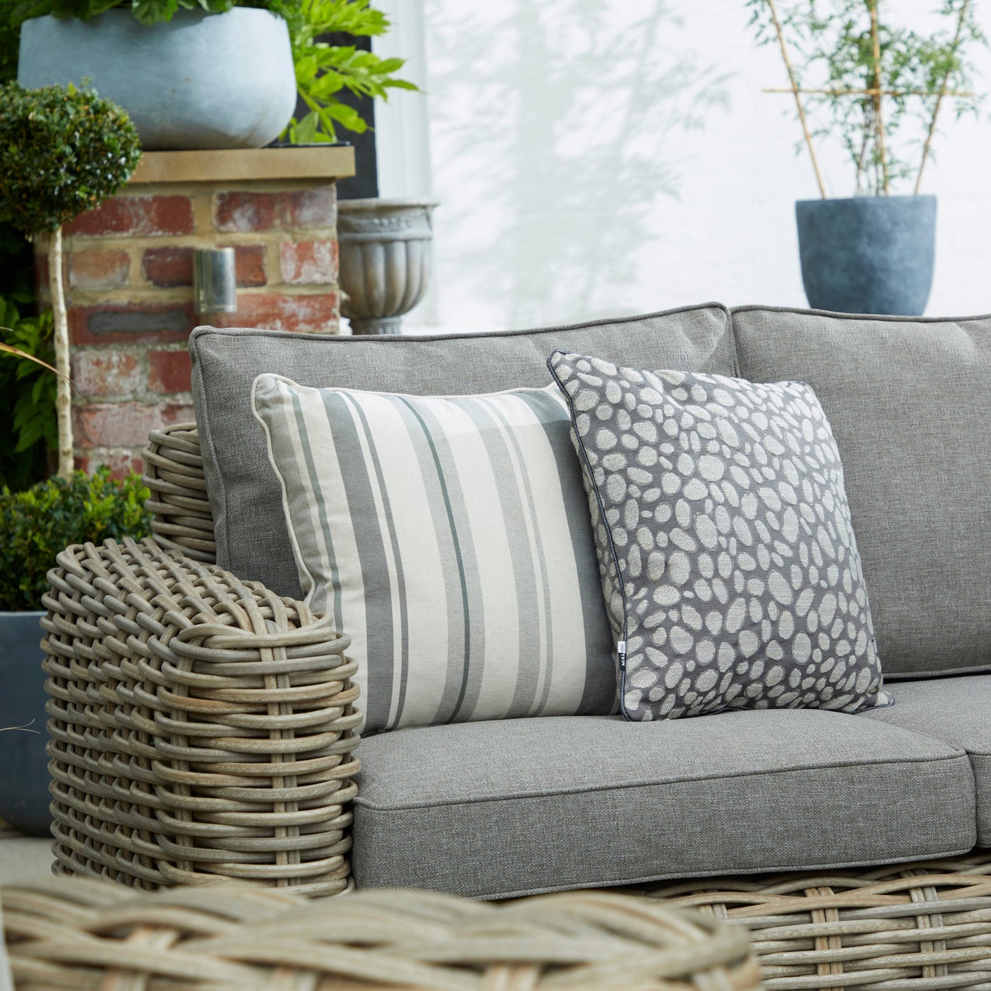 Angle view of Hill Interiors Amalfi outdoor set highlighting the comfortable design