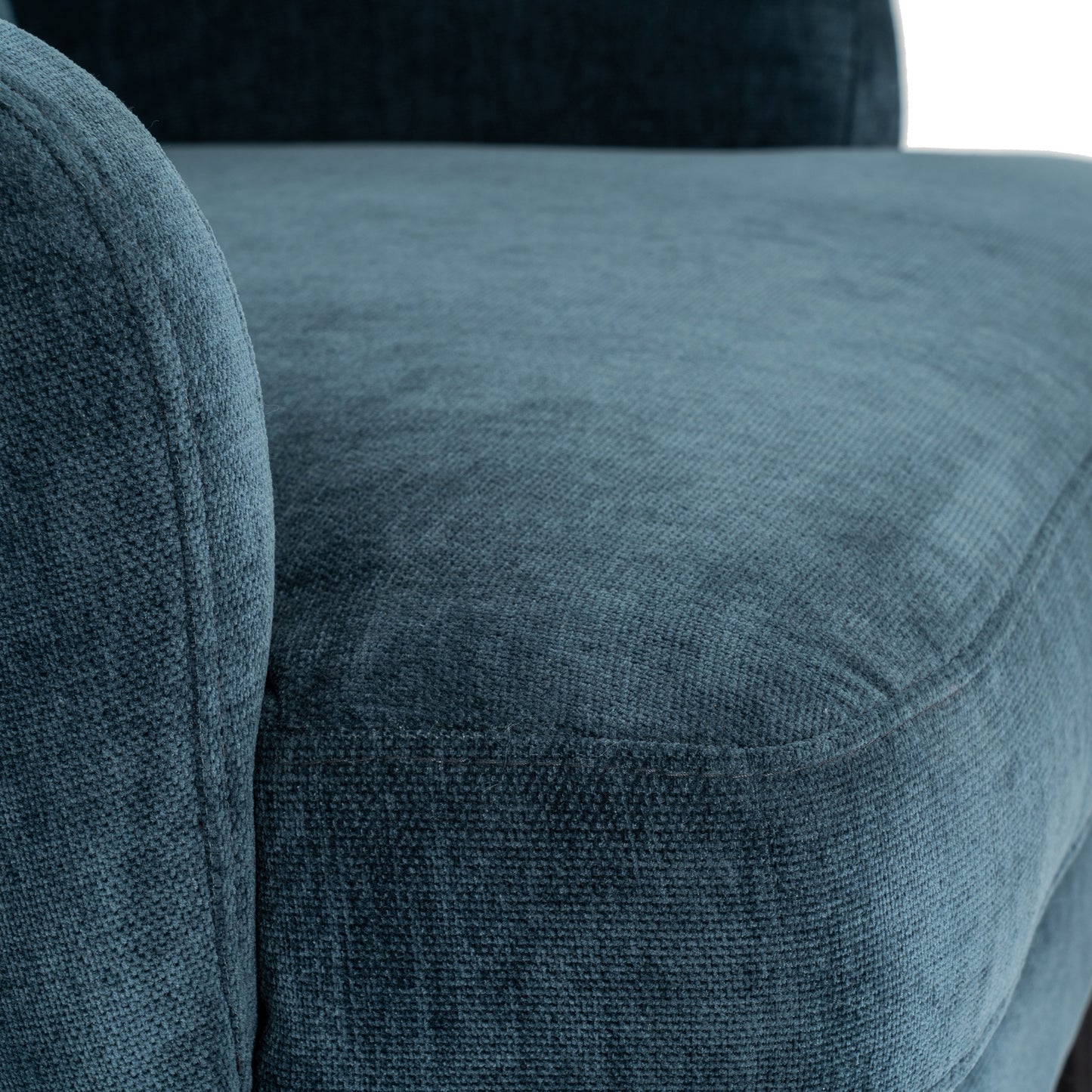 Hill Interiors Avaris wingback armchair styled with cushions and throws
