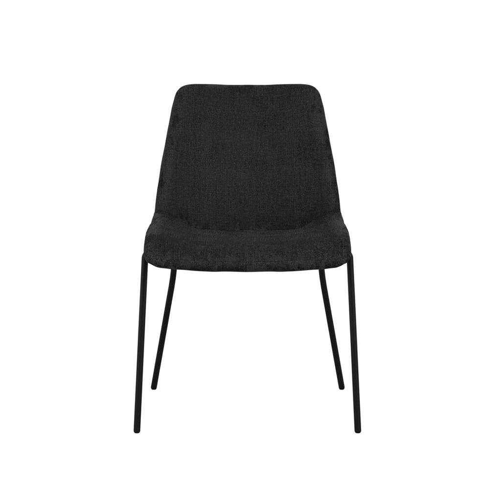 LPD Furniture Carlo black textured velvet dining chair with curved metal back in a modern dining setting