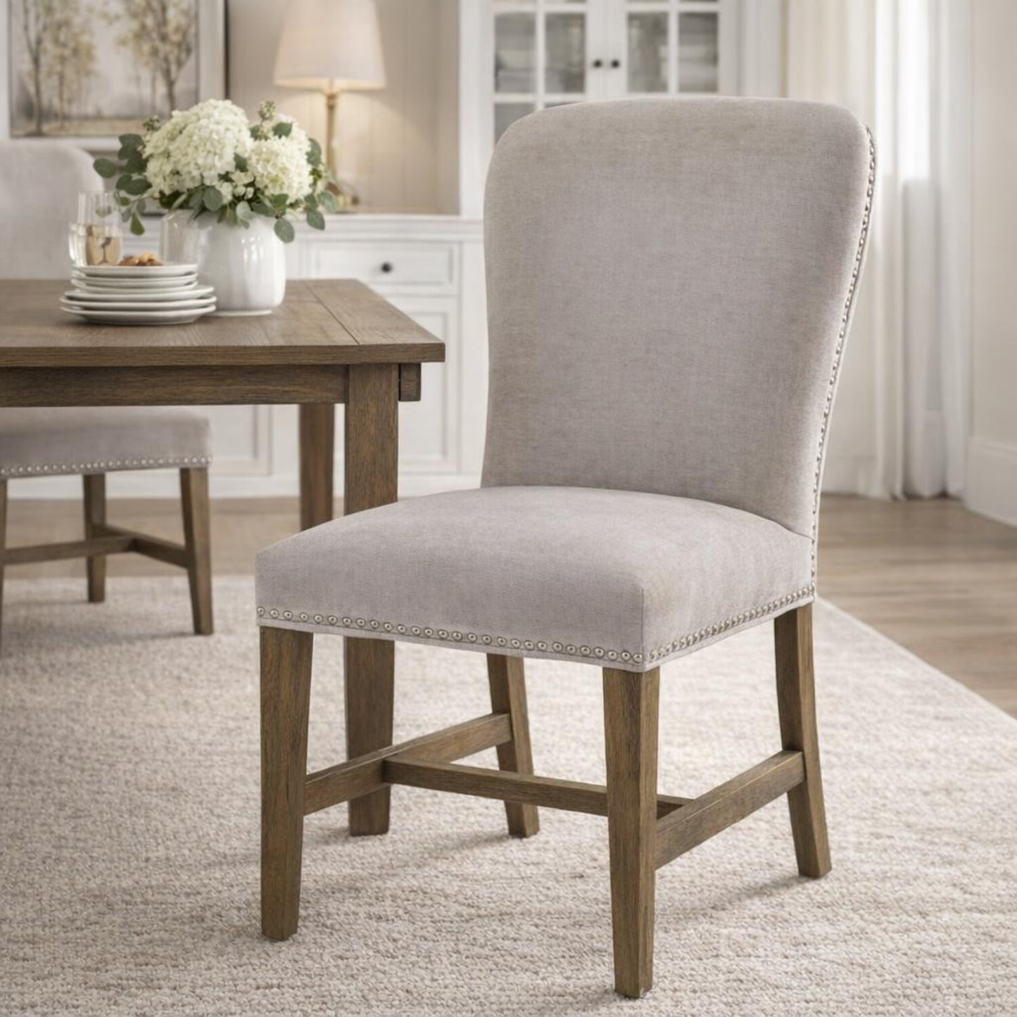 Hill Interiors Cobham grey dining chair showing seat cushion thickness and overall proportions