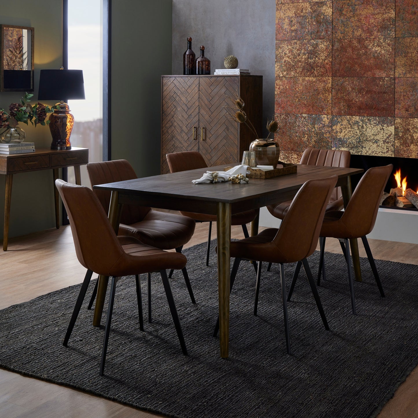 Hill Interiors Malmo tan dining chair styled with modern dinnerware on a dining table