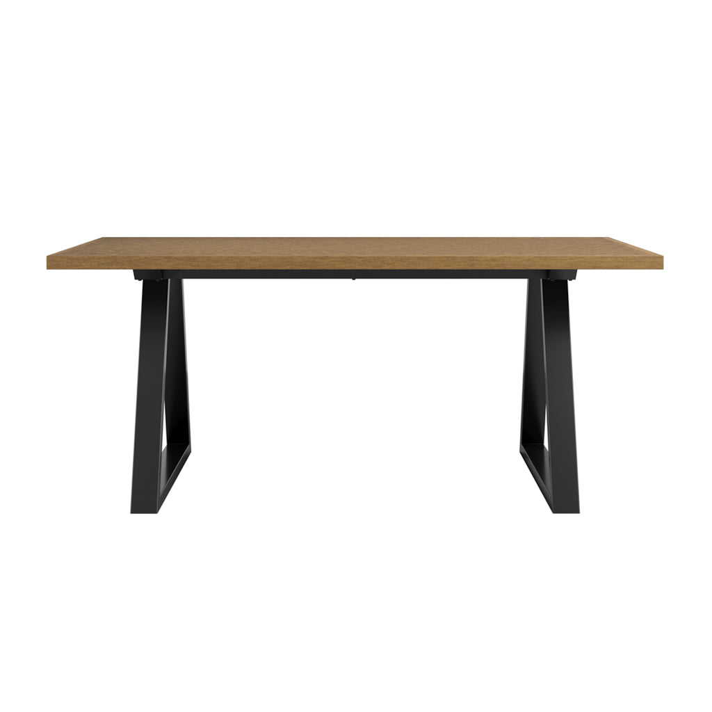 LPD Furniture Hyde whiskey wood herringbone dining table with black metal legs in a modern dining setting