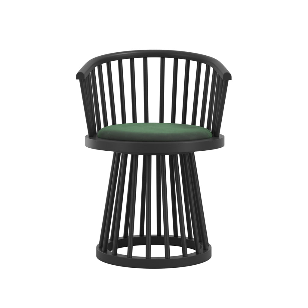 LPD Furniture Lina forest green velvet dining chair with curved spindle back and black satin wood frame in a modern dining setting