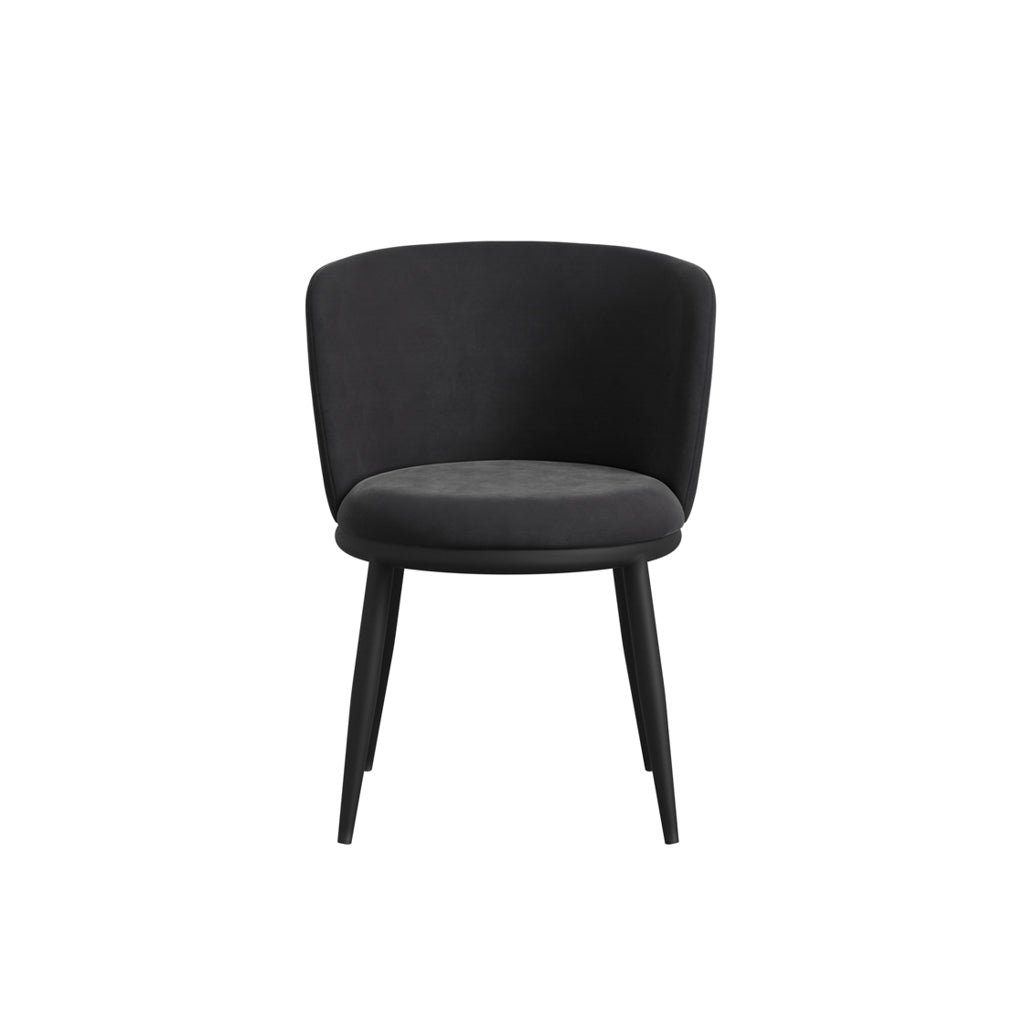 LPD Furniture Nova black velvet dining chair with angular metal legs in a modern dining setting