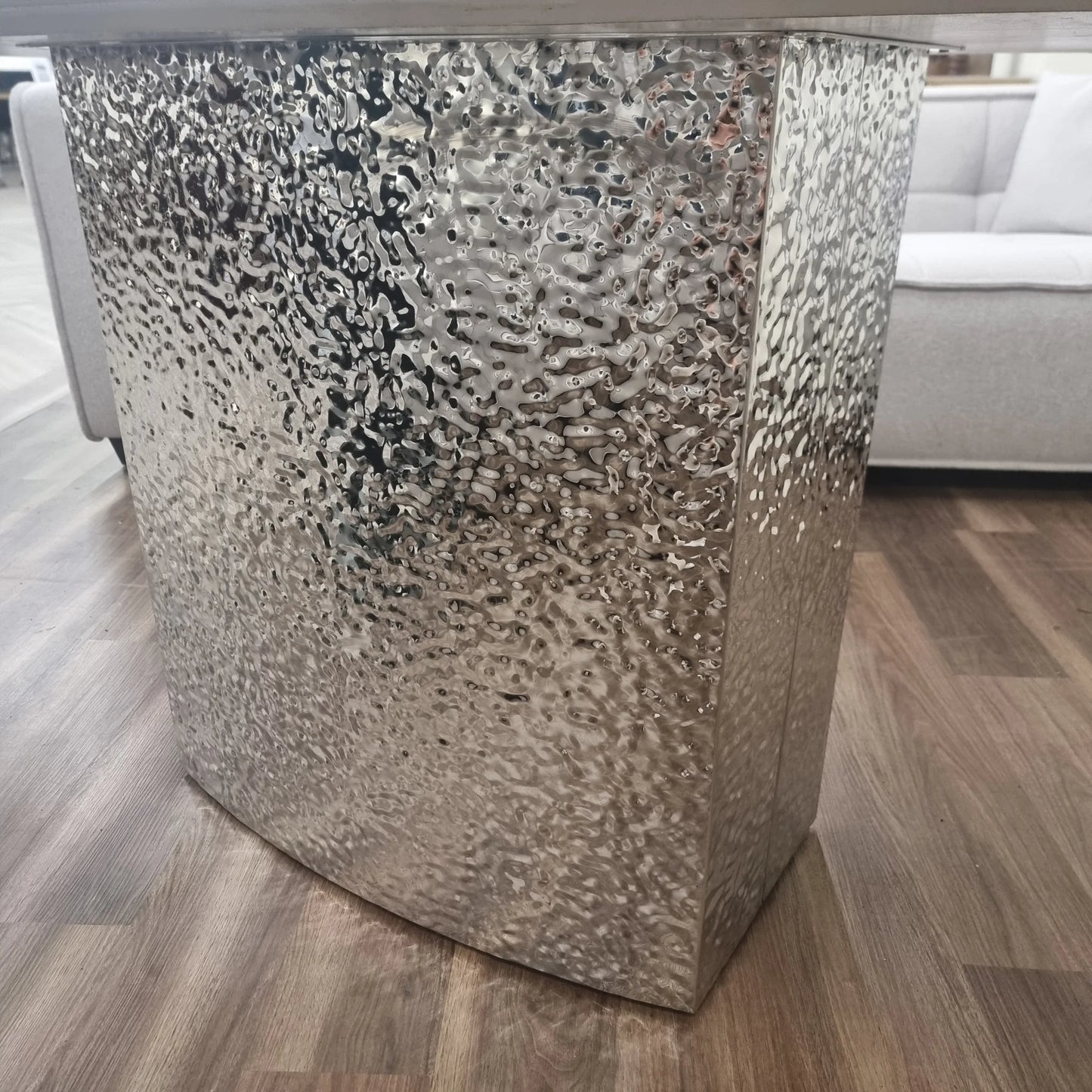 Furnish365 Roma marble dining table with hammered metal base in a contemporary dining room setting