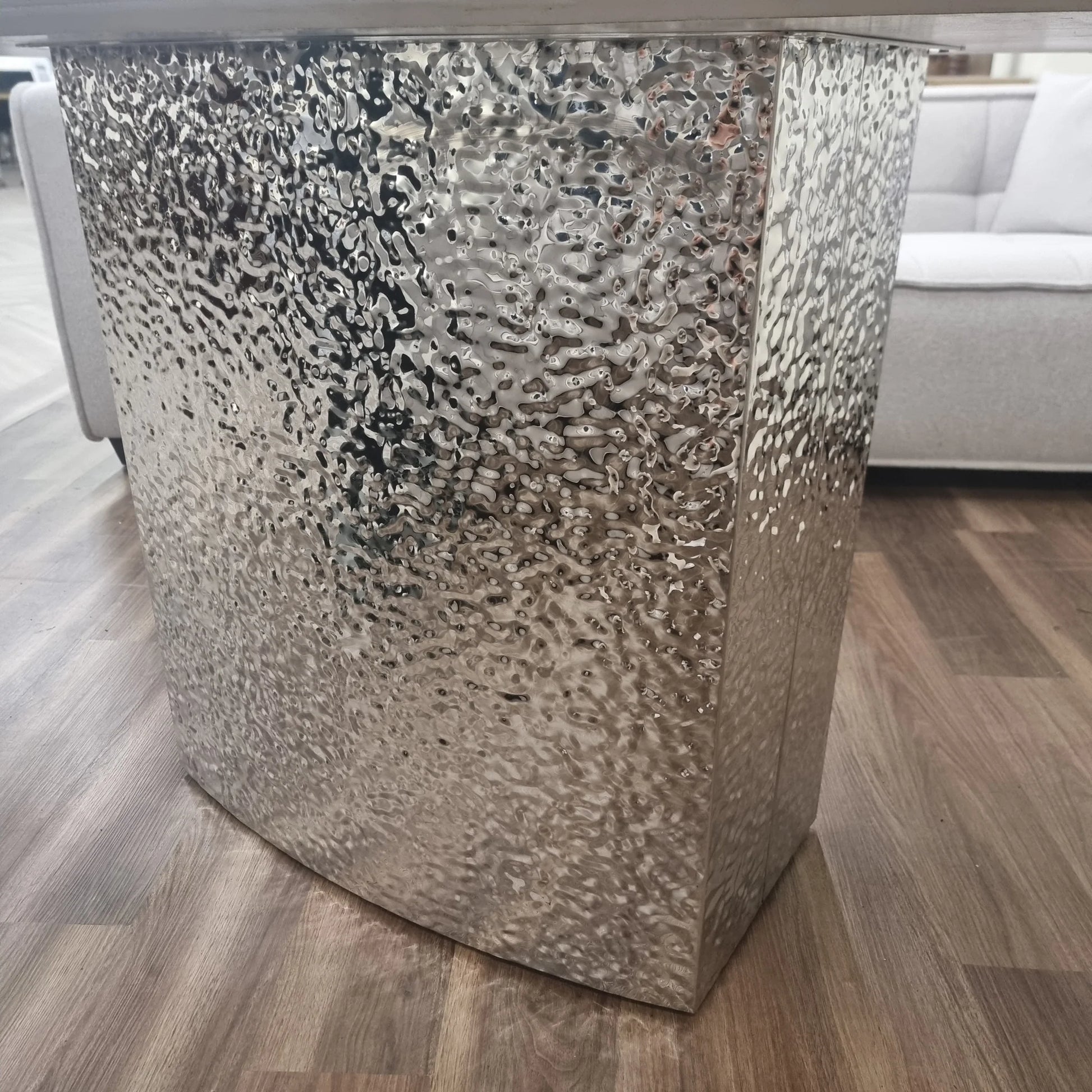 Furnish365 Roma marble dining table with hammered metal base in a contemporary dining room setting