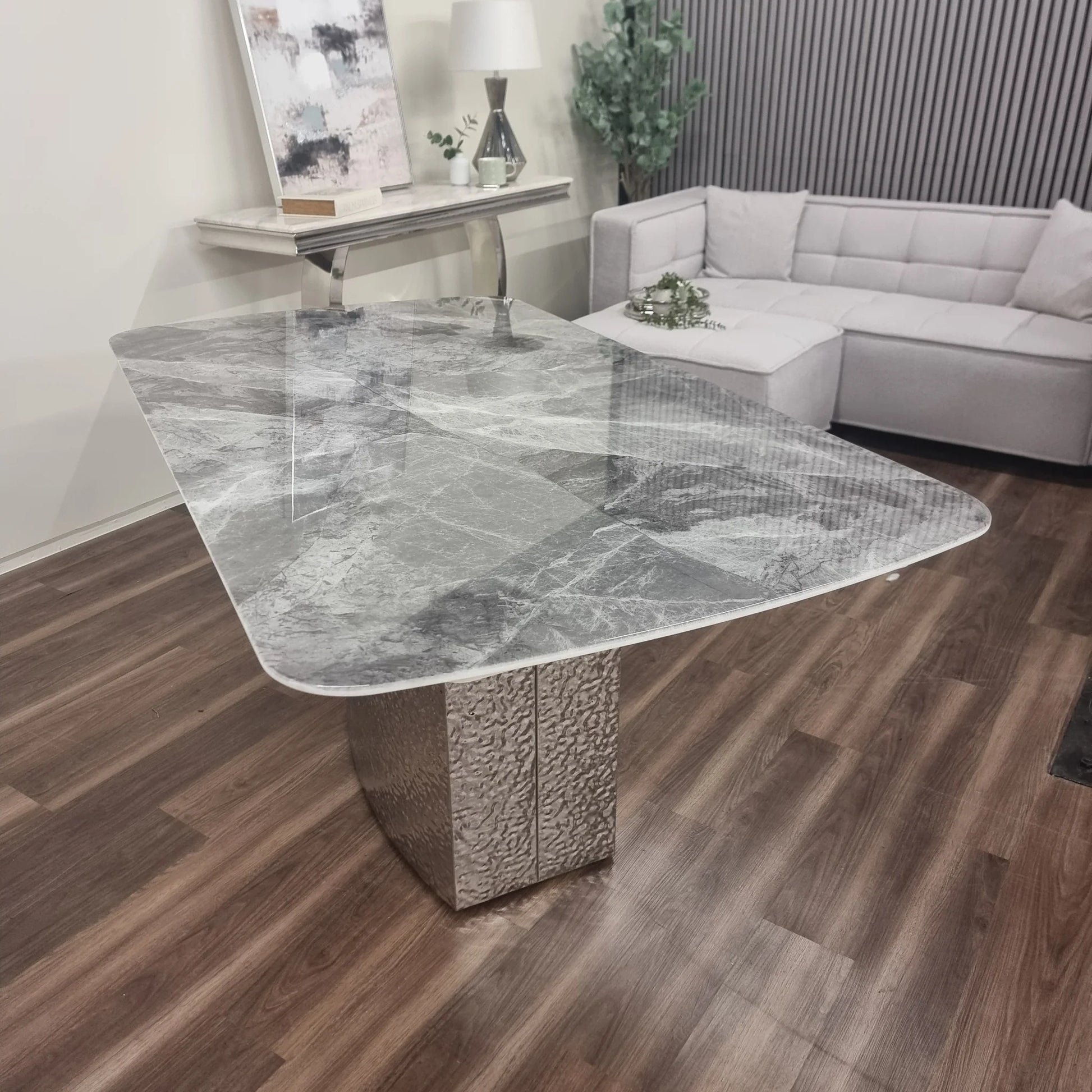 Furnish365 Roma marble dining table with hammered metal base in a contemporary dining room setting