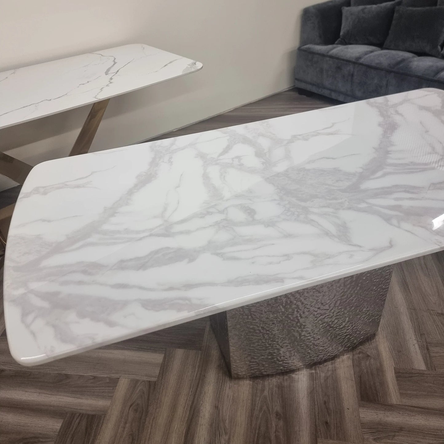 Furnish365 Roma marble dining table with hammered metal base in a contemporary dining room setting