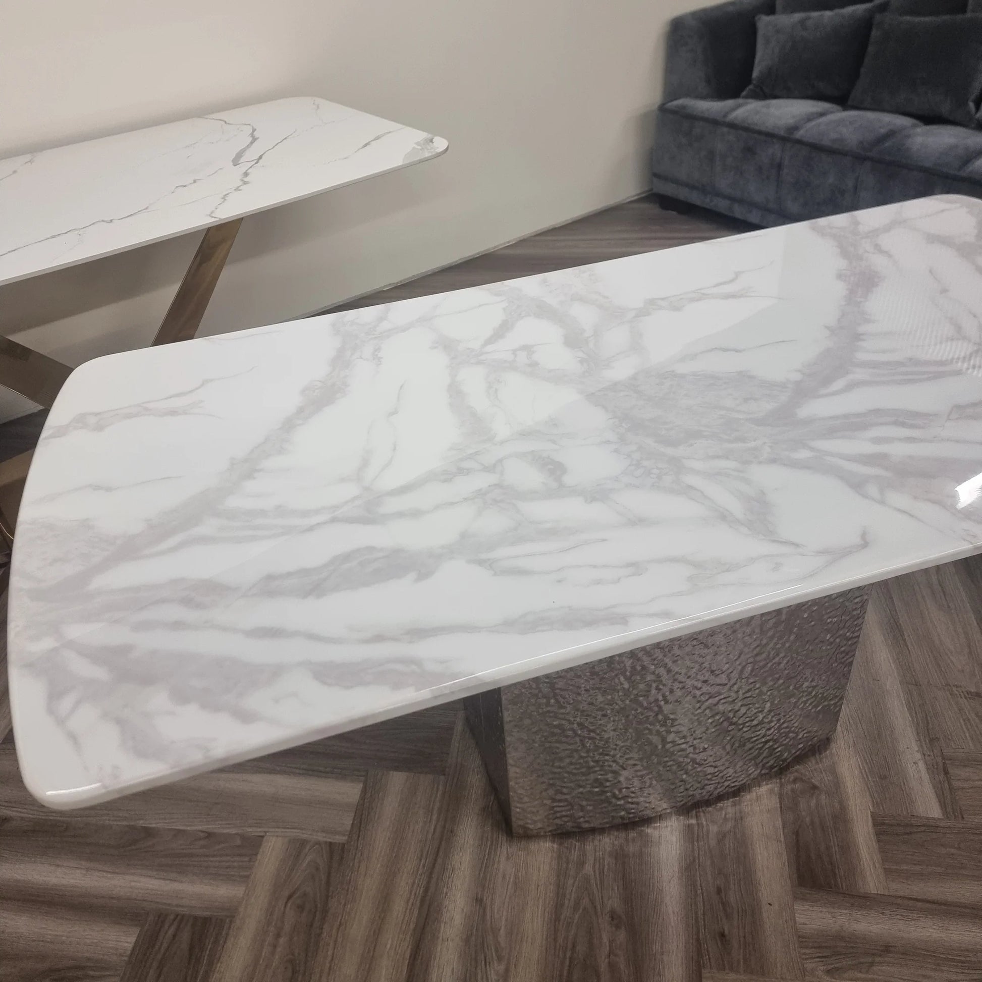 Furnish365 Roma marble dining table with hammered metal base in a contemporary dining room setting