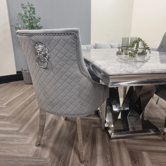 Furnish365 Bentley velvet dining chair with quilted back and chrome lion knocker in a modern dining setting