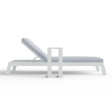 ALUXO Dasia white reclining sun lounger with matching side table in a modern garden setting