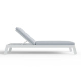 ALUXO Dasia white reclining sun lounger with matching side table in a modern garden setting