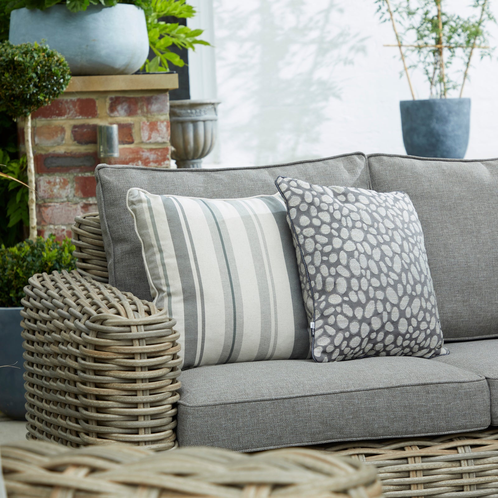 	Angle view of Hill Interiors Amalfi outdoor set highlighting the comfortable design