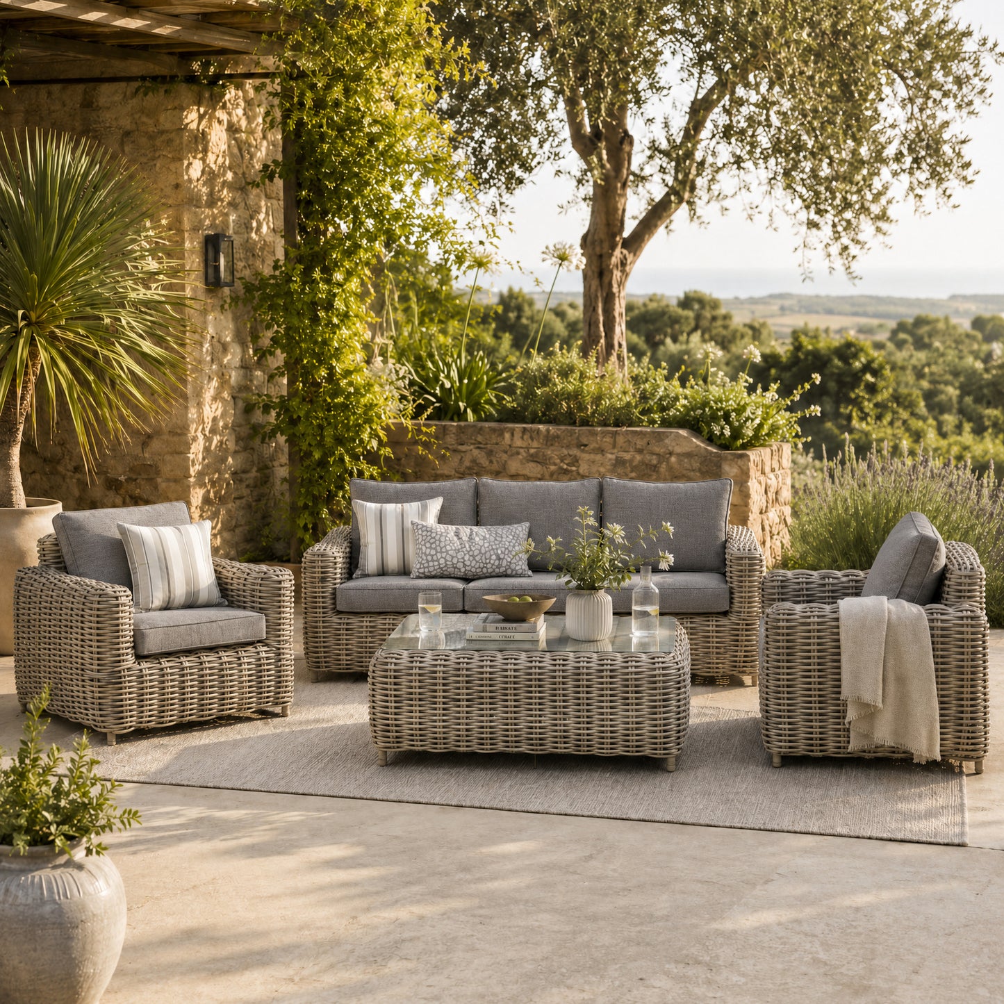 Hill Interiors Amalfi Collection outdoor five seater beige set in a modern garden setting