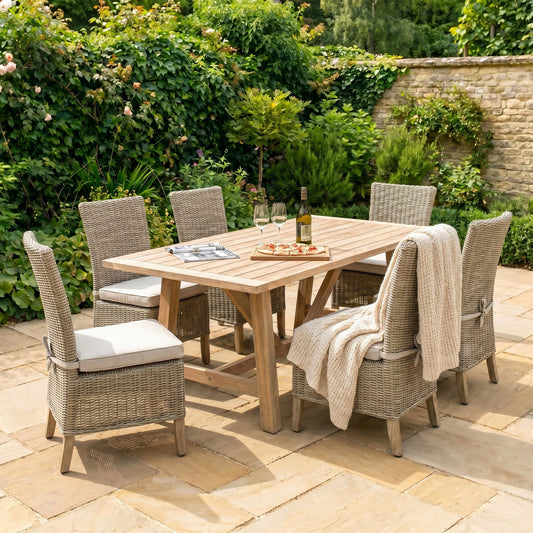 Hill Interiors Capri Collection beige outdoor dining chair in a modern garden setting