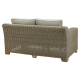 Hill Interiors Capri beige outdoor sofa in a contemporary patio with natural lighting