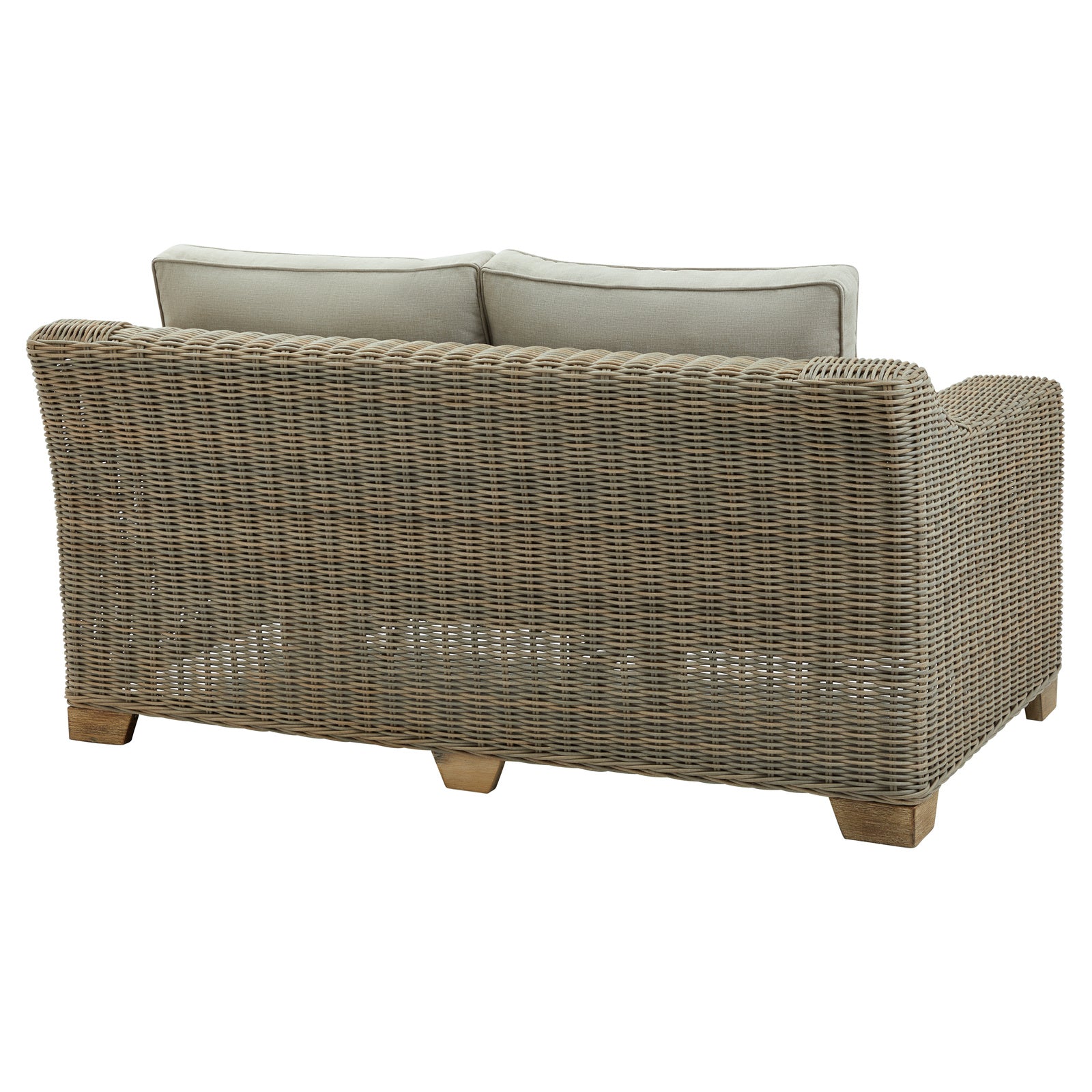 Hill Interiors Capri beige outdoor sofa in a contemporary patio with natural lighting