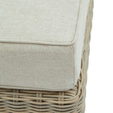 Hill Interiors Capri beige outdoor foot stool in a contemporary patio with natural lighting