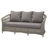 Hill Interiors Palma beige outdoor set in a contemporary patio with natural lighting