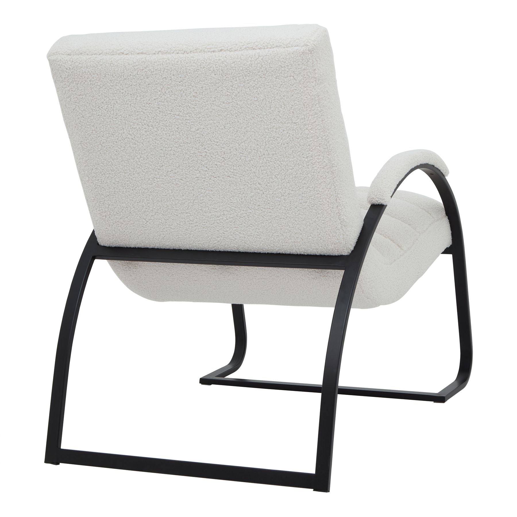 	Side view of Hill Interiors Boucle Ribbed Ark chair showing the ribbed texture and sleek metal frame