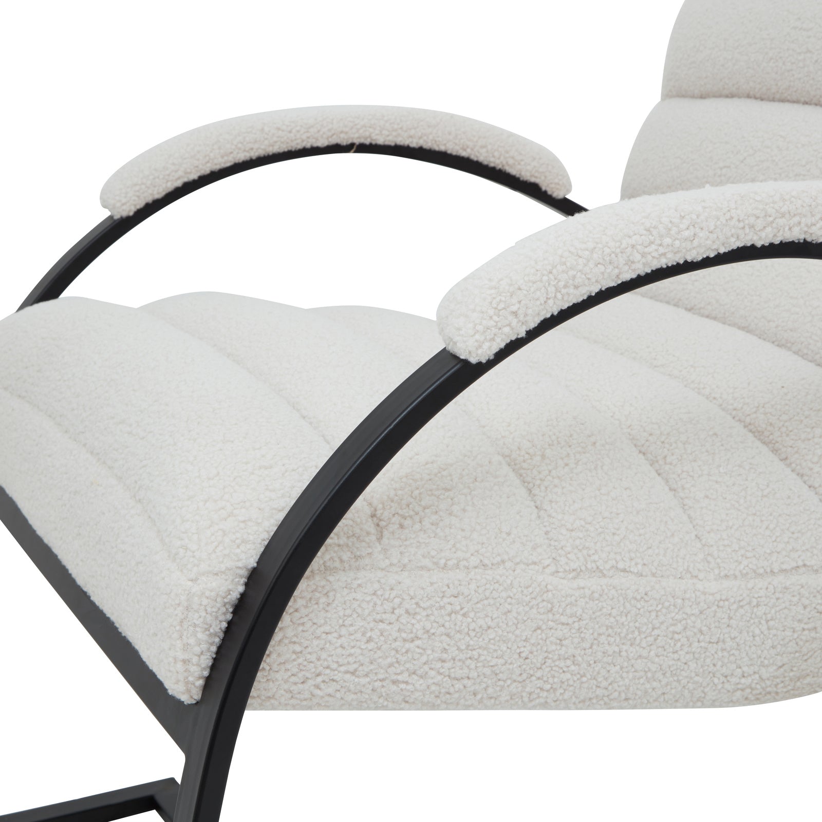	Hill Interiors Boucle Ribbed Ark chair showing the seat cushion thickness and overall proportions