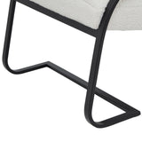 Hill Interiors Boucle Ribbed Ark chair styled with cushions and throws
