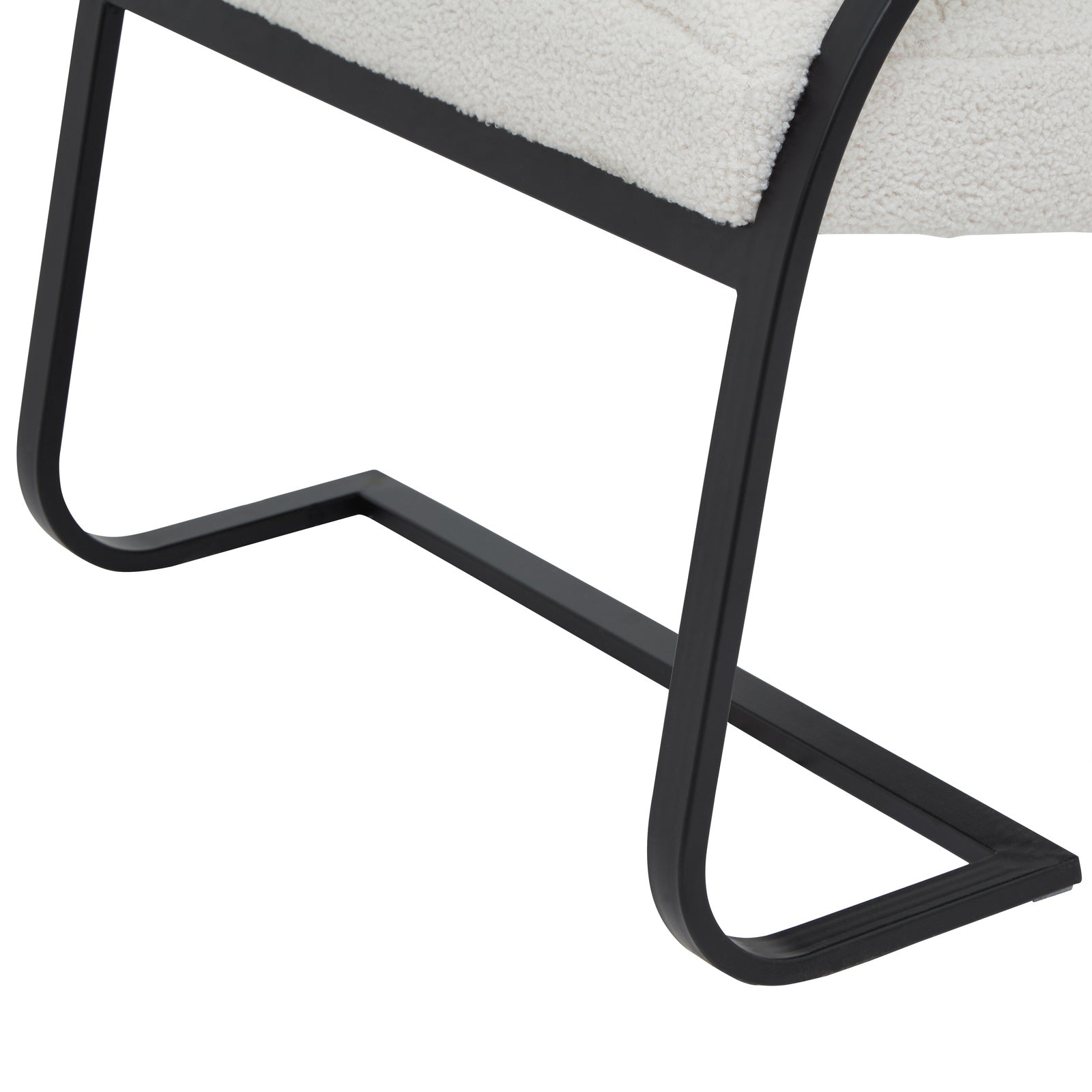 Hill Interiors Boucle Ribbed Ark chair styled with cushions and throws