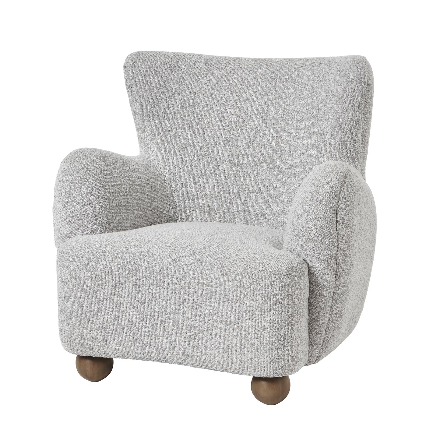 Side view of Hill Interiors Greige Hui large armchair showing the spacious silhouette and fabric upholstery