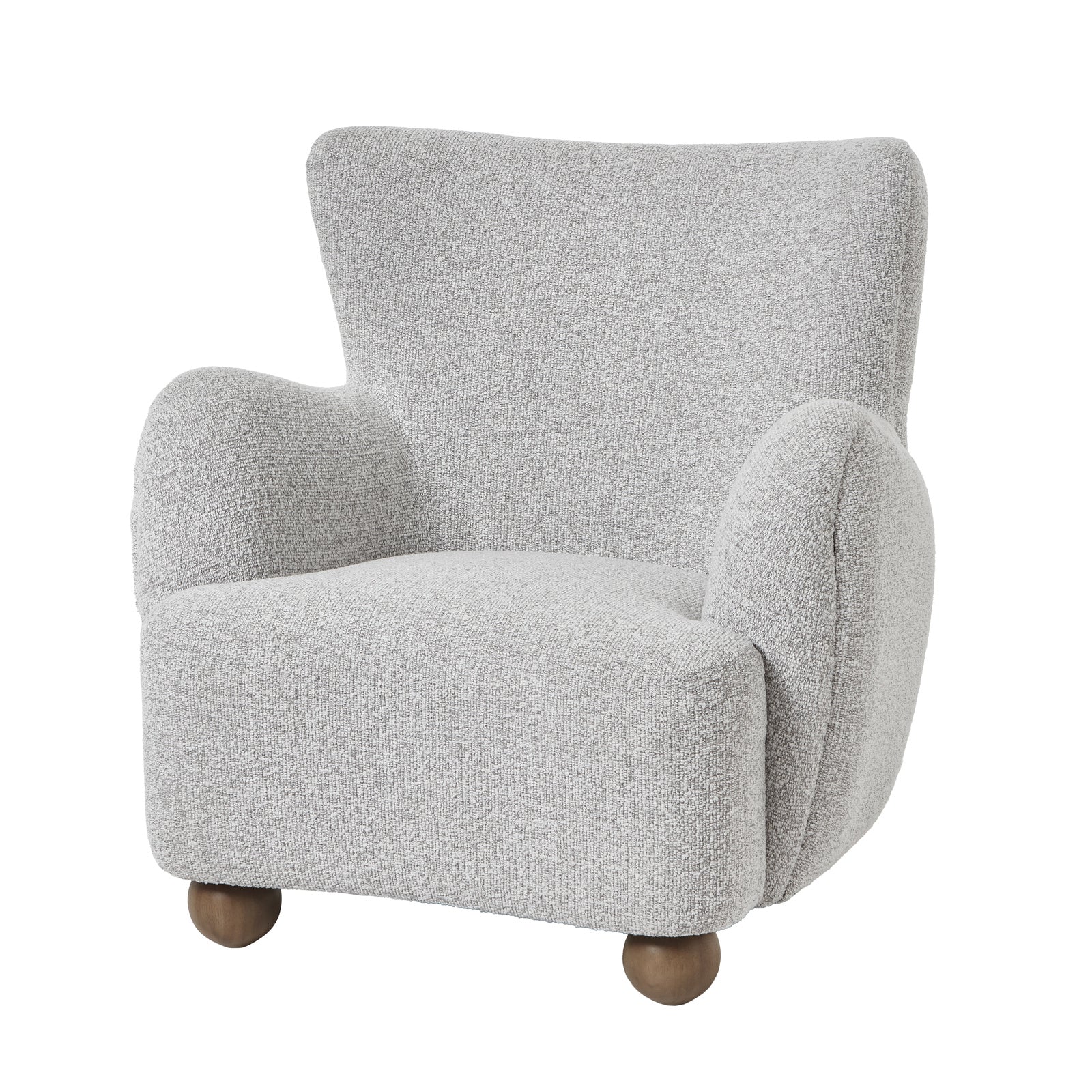 Side view of Hill Interiors Greige Hui large armchair showing the spacious silhouette and fabric upholstery