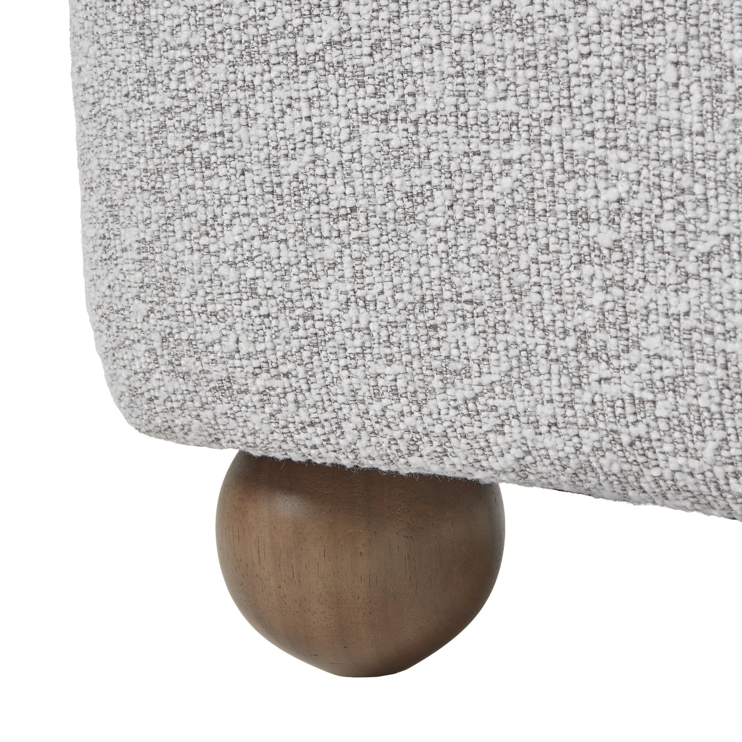 Close-up of Hill Interiors Greige Hui armchair showcasing the fabric texture and stitching details