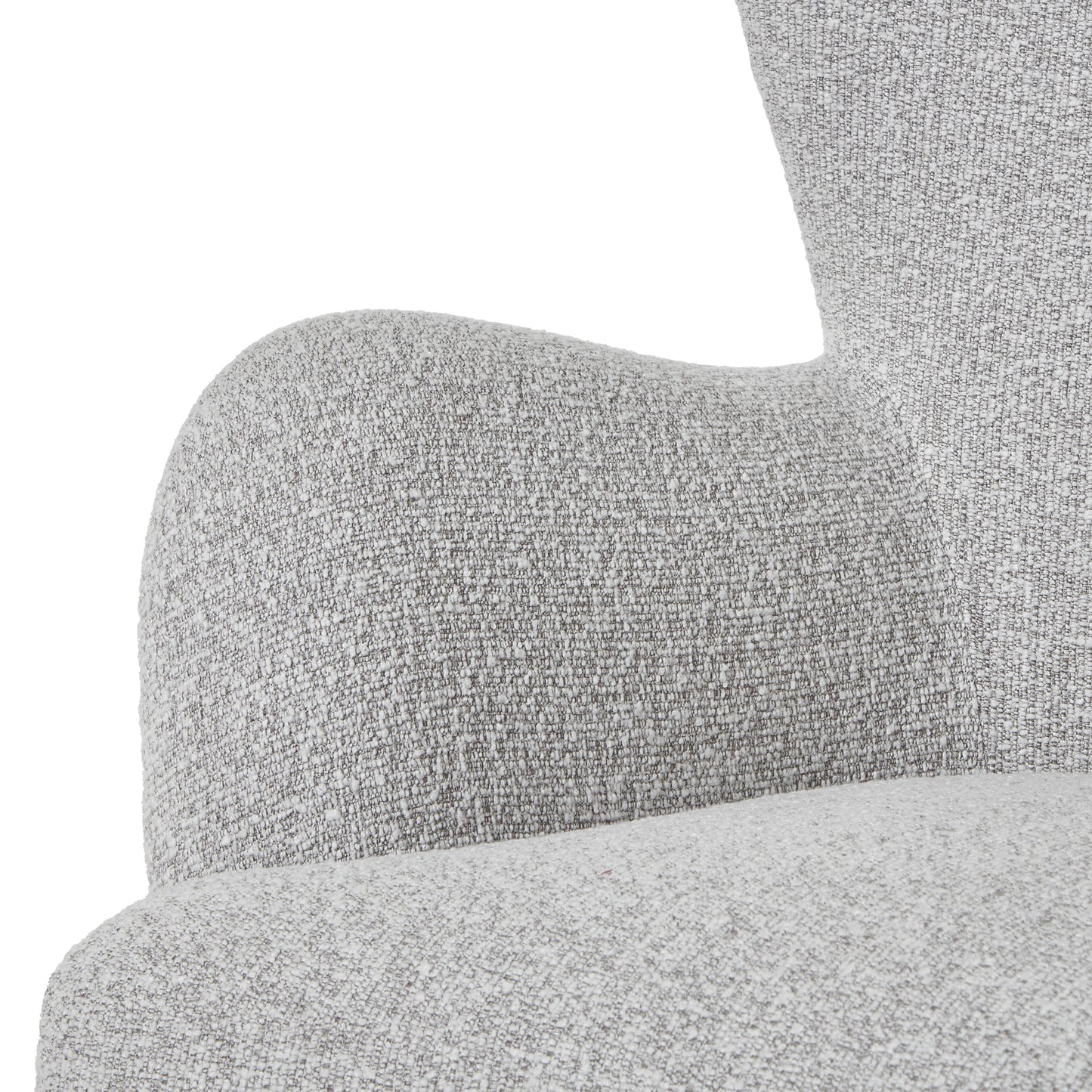 Hill Interiors Greige Hui armchair in a contemporary living room with natural lighting
