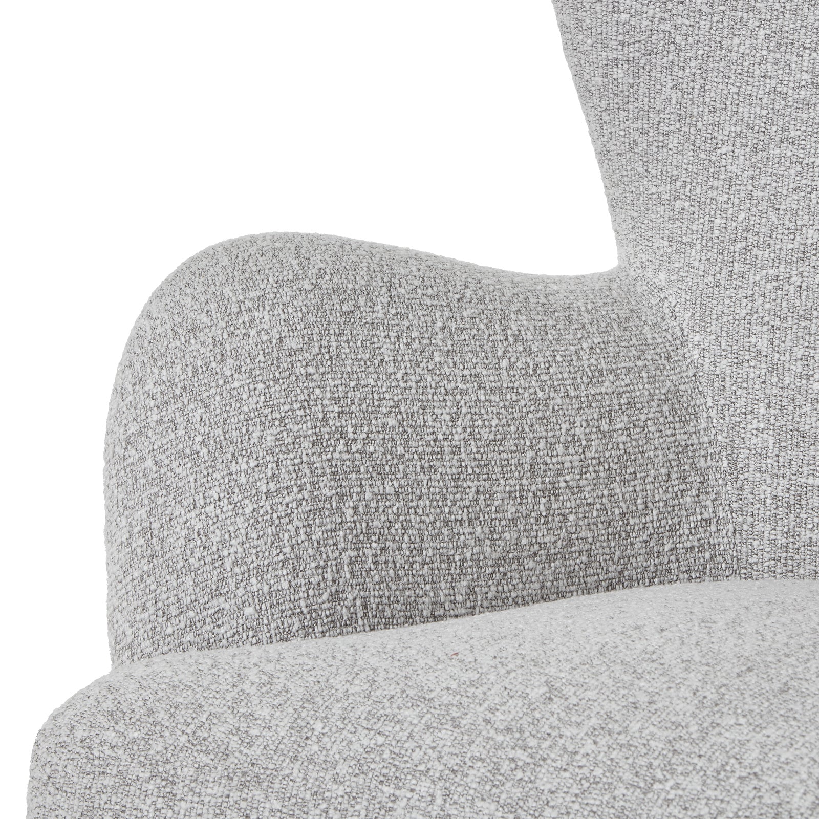 Hill Interiors Greige Hui armchair in a contemporary living room with natural lighting