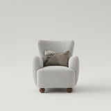Hill Interiors Greige Hui large fabric armchair placed in a modern living room setting