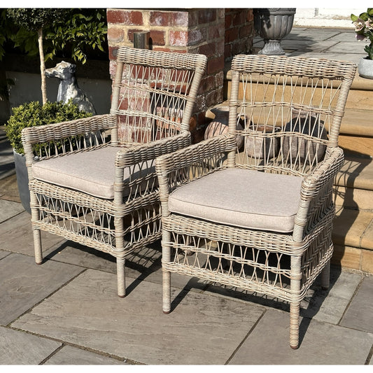Close-up of Hill Interiors Provence outdoor dining chair showcasing the synthetic fabric texture and stitching details