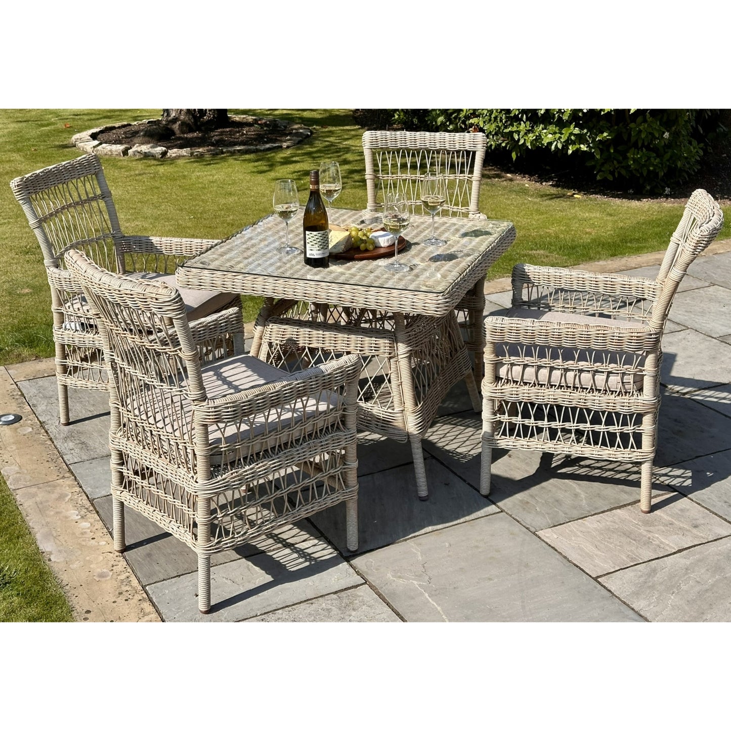 	Hill Interiors Provence outdoor dining chair showing the seat cushion thickness and overall proportions