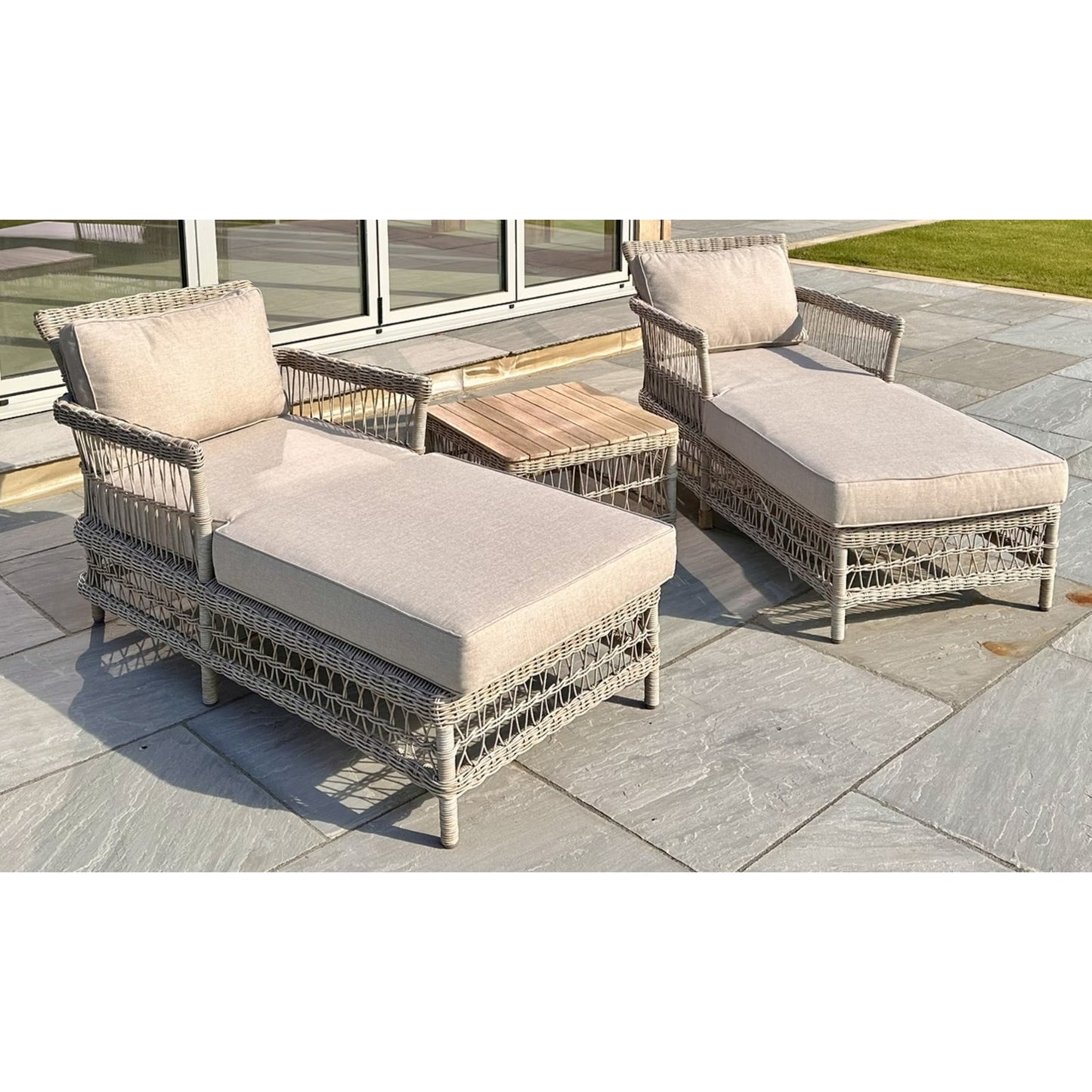 Close-up of Hill Interiors Provence sun lounger showcasing the synthetic fabric texture and stitching details