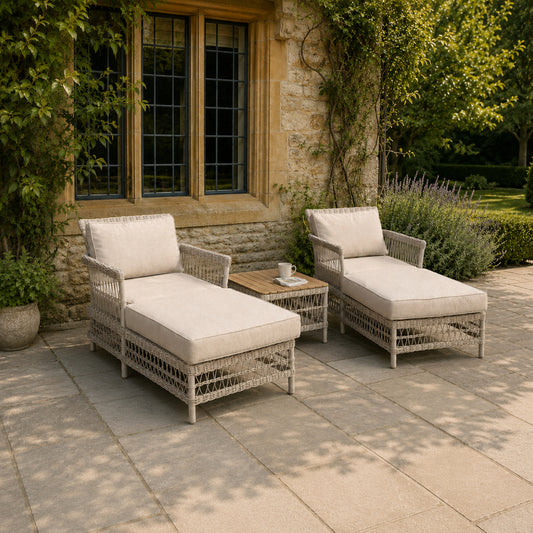 	Hill Interiors Provence Collection beige outdoor sun lounger set in a modern garden setting