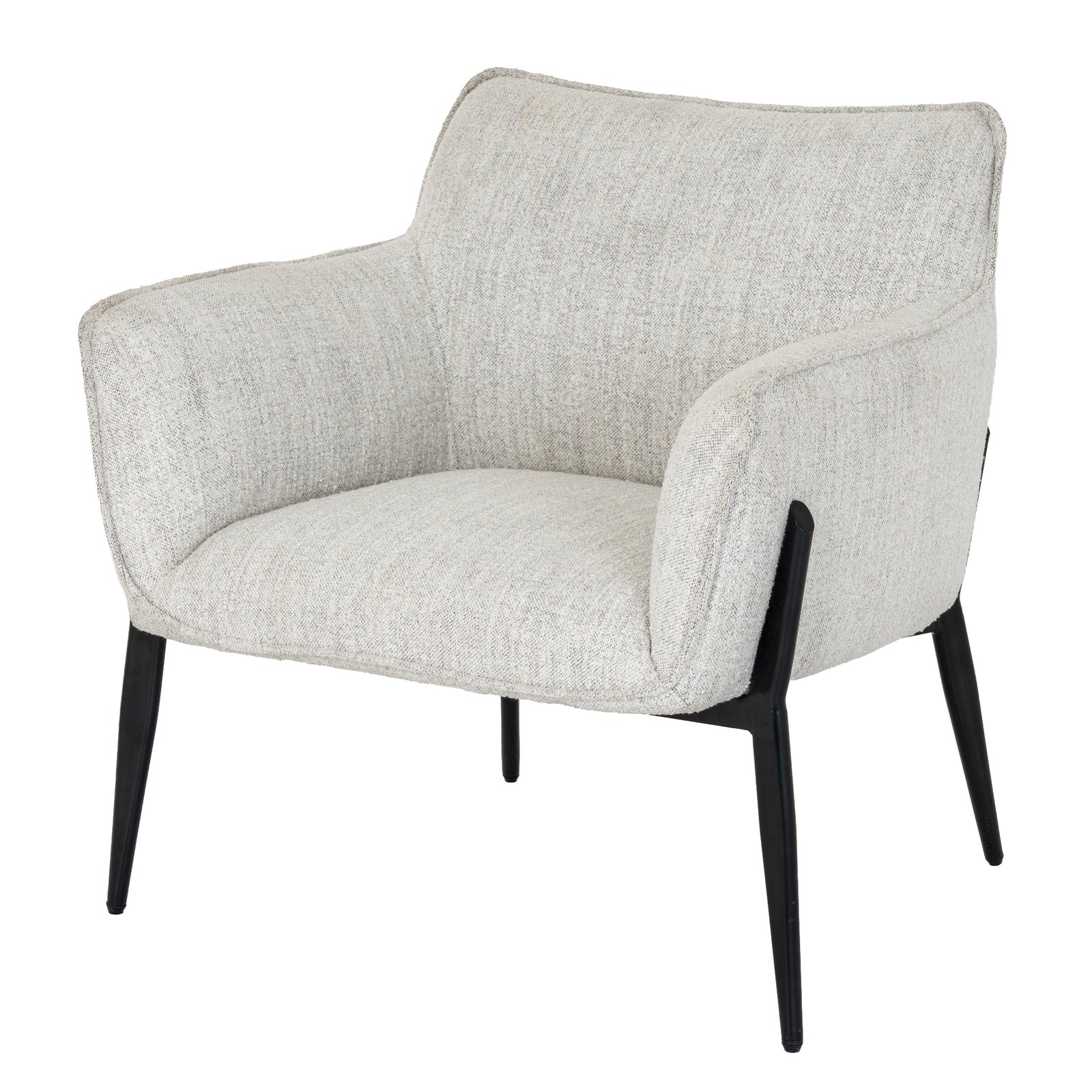 Hill Interiors Zephra armchair in a contemporary living room with natural lighting