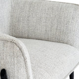 	Close-up of Hill Interiors Zephra armchair showcasing the white fabric texture and stitching details