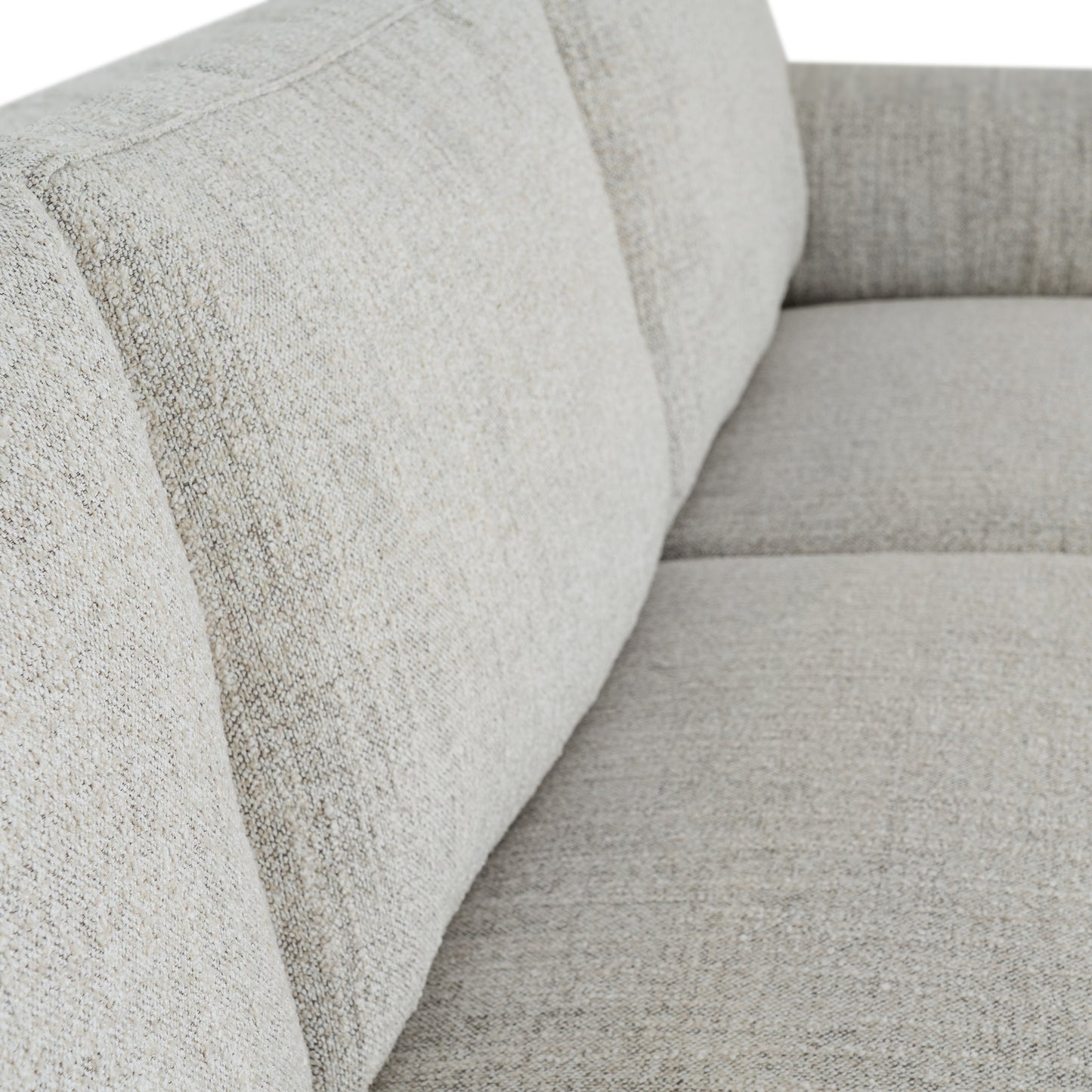 	Hill Interiors Zephra white sofa with footstool in a contemporary living room with natural lighting