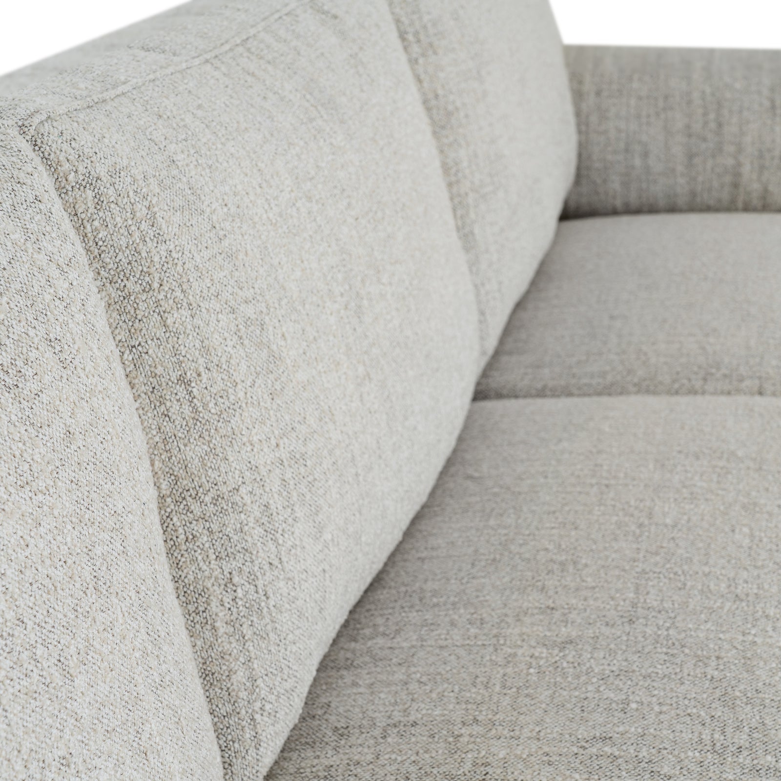 	Hill Interiors Zephra white sofa with footstool in a contemporary living room with natural lighting