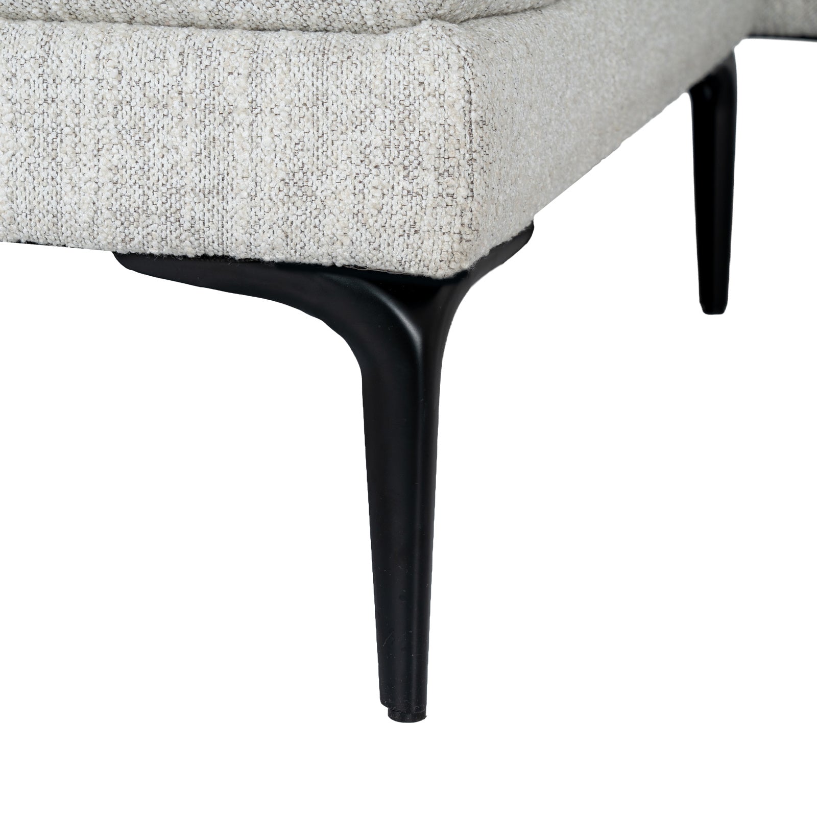 Angle view of Hill Interiors Zephra sofa highlighting the comfortable design and footstool