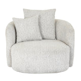 	Hill Interiors Sorelle white swivel armchair in a contemporary living room with natural lighting
