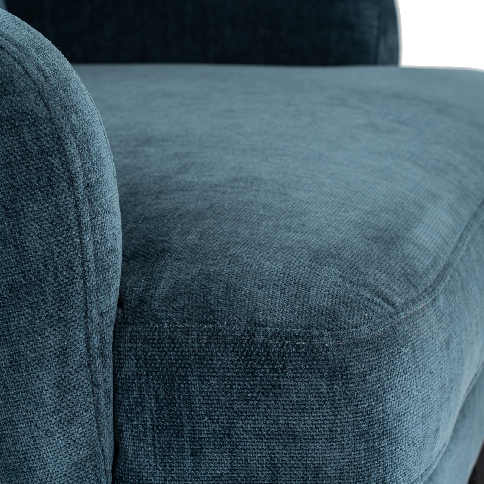 Hill Interiors Avaris wingback armchair styled with cushions and throws