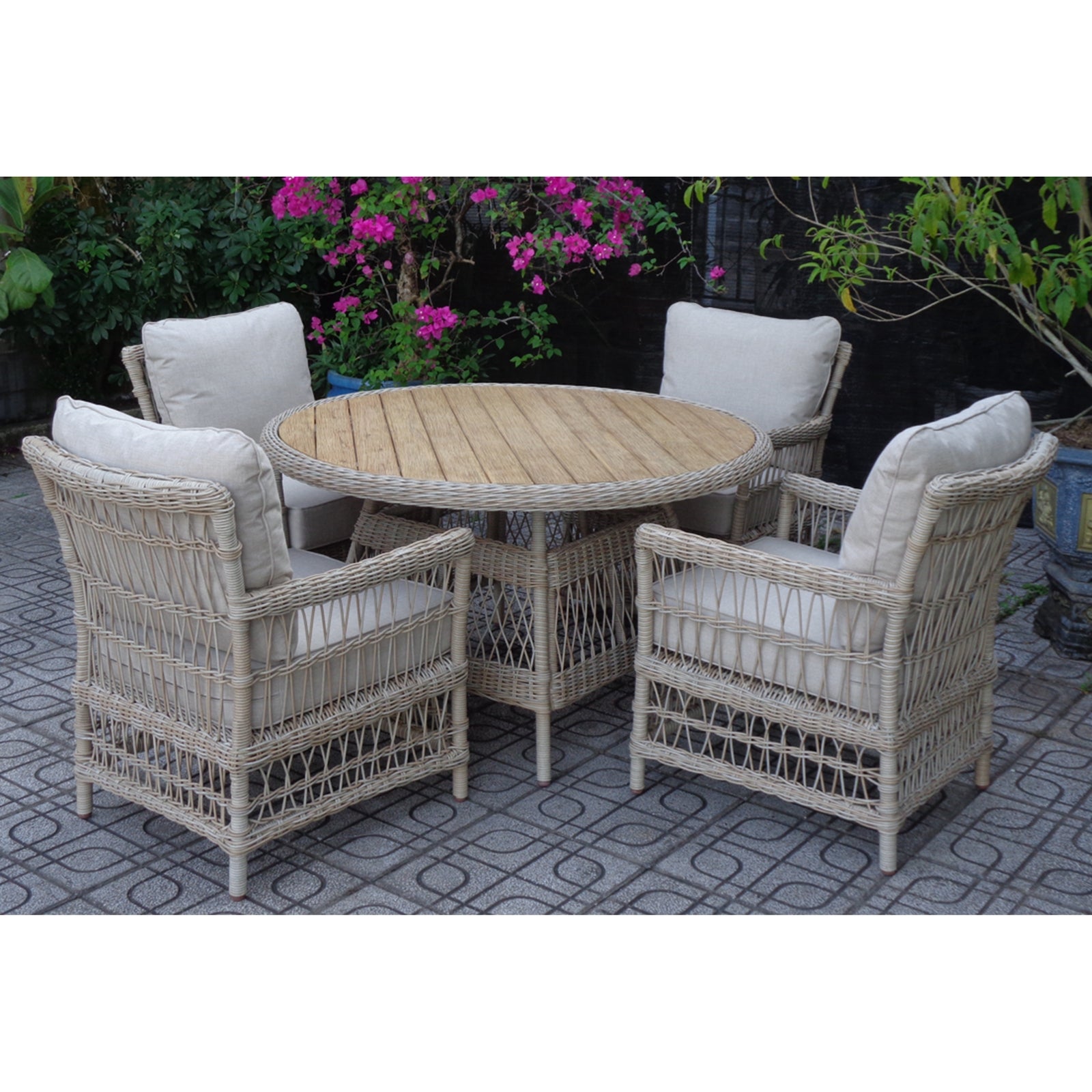 Hill Interiors Provence Collection outdoor bistro table with wood top and metal frame in a modern garden setting