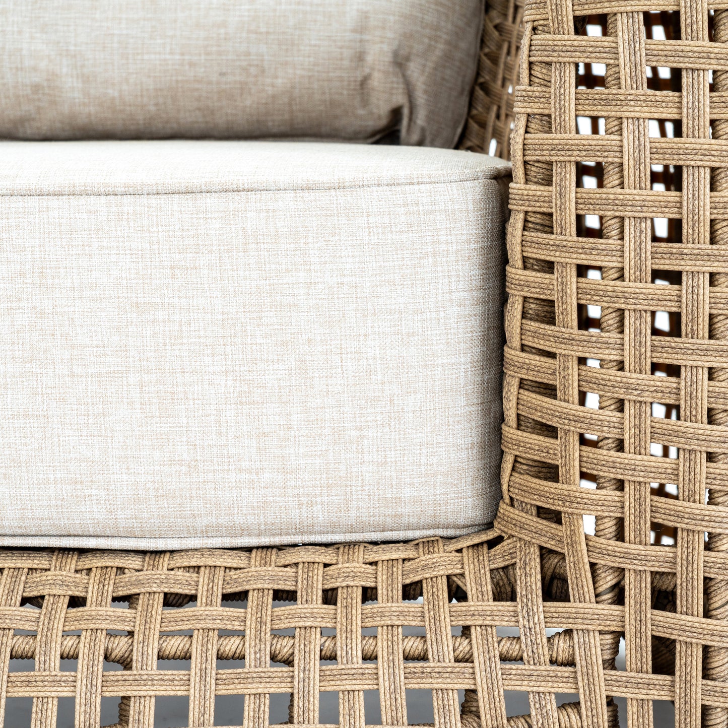 Hill Interiors Bloom Collection brown outdoor large lounge chair in a modern garden setting