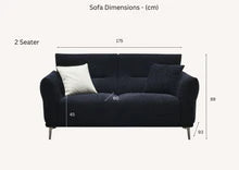	Furnish365 Astoria iron bouclé 3 seater sofa with deep channel stitching in a modern living room setting
