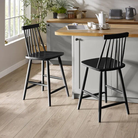 Alassio black spindle back bar stool in a modern kitchen or bar setting