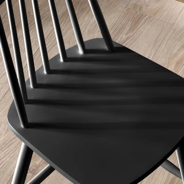 Alassio black spindle back bar stool in a modern kitchen or bar setting