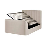 Alana cream velvet TV bed with remote-controlled lift in a modern bedroom setting